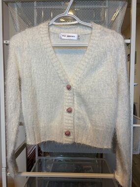 Cream Fuzzy V-Neck Cardigan with Pink Button Detail